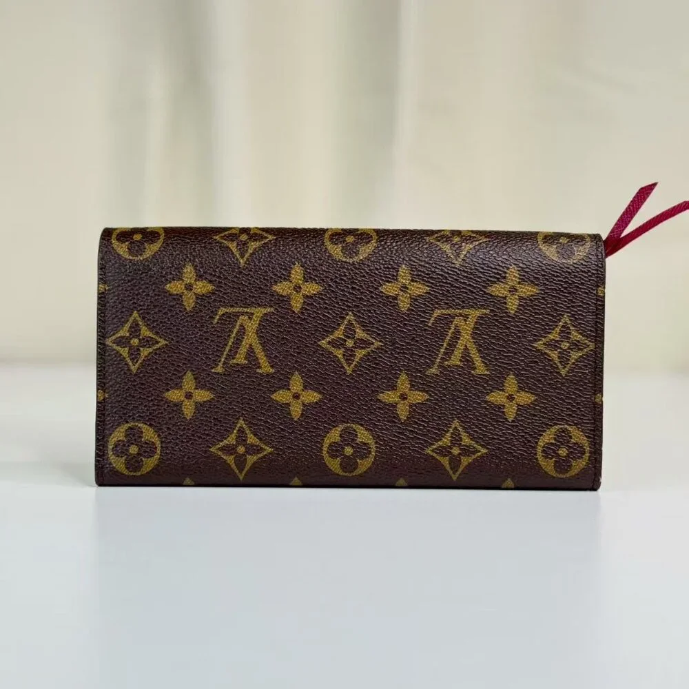 Louis Vuitton Monogram Canvas Wallet with Classic LV Pattern and Red Button